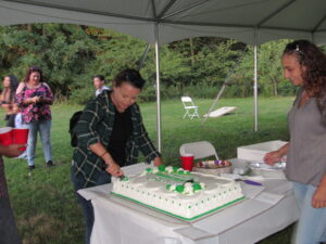 Stacie Faille cuts her graduation cake