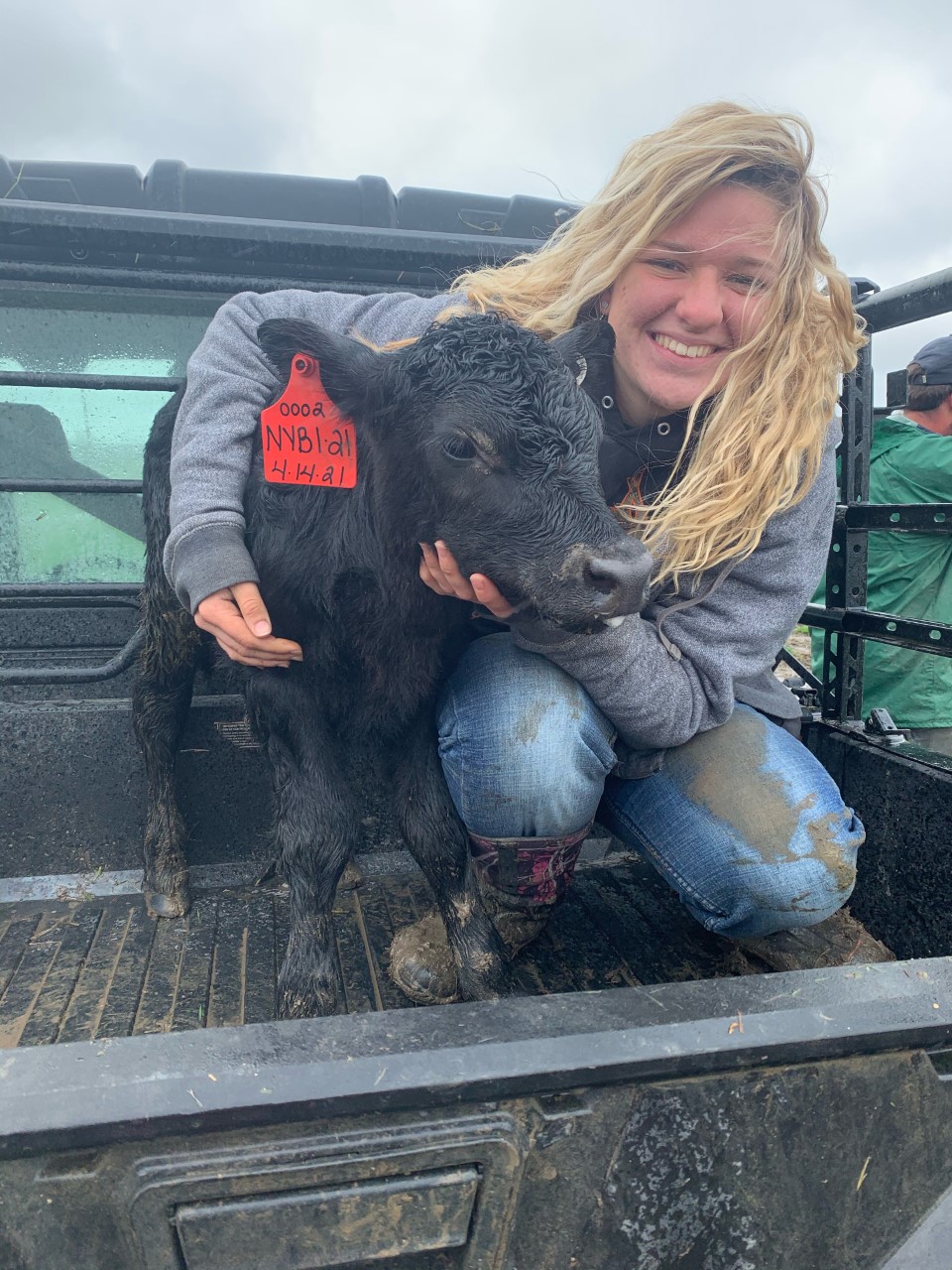 Kylah Lindgren with our first baby bull calf of 2021